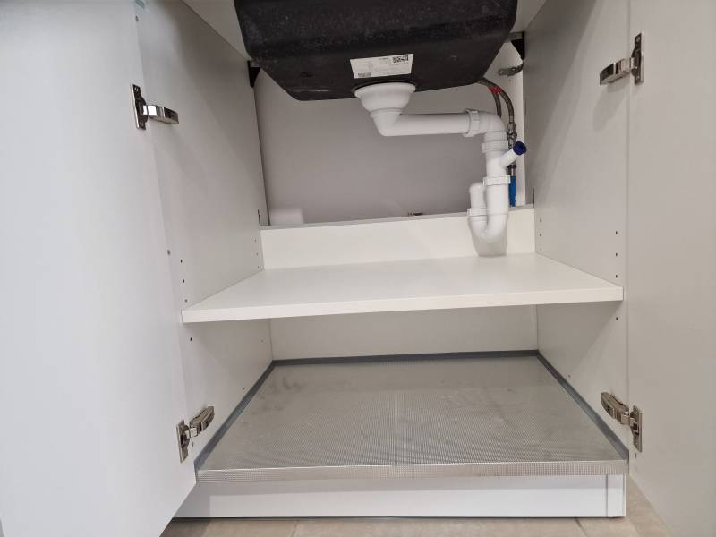 Syphon gain de place sous la cuve d'évier pour gagner de la place dans la cuisine